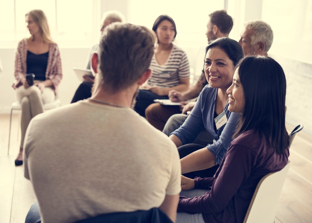 Participants in a Circle Engaging in a Discussion in an Intensive Outpatient Program in Columbus, OH