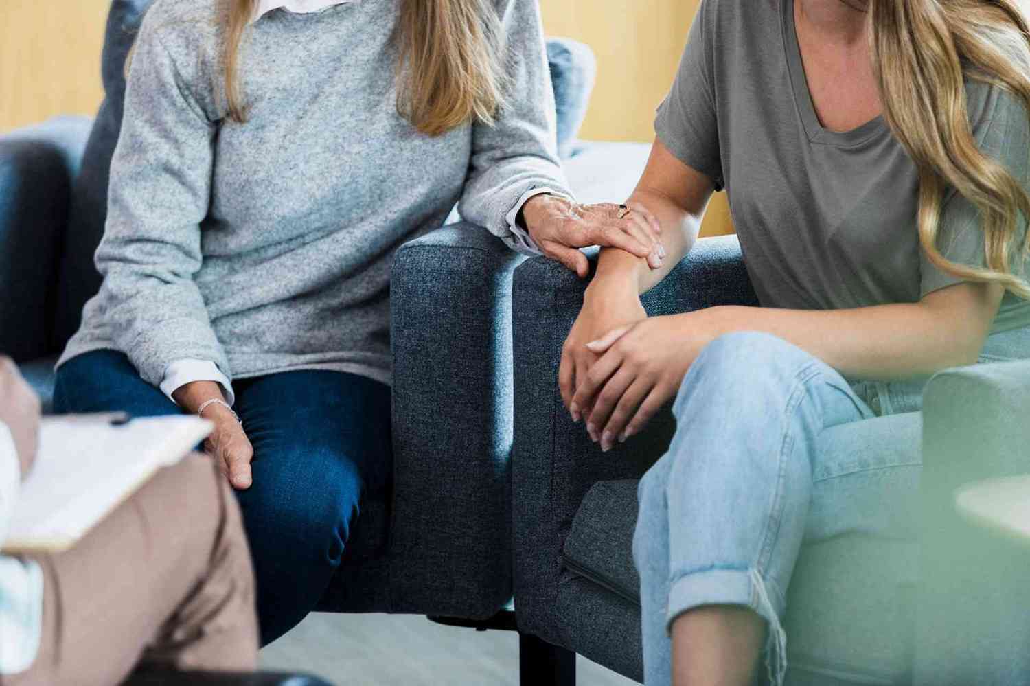 A Woman Offering Supportive Reassurance to a Patient During a Therapy Session in Columbus, OH